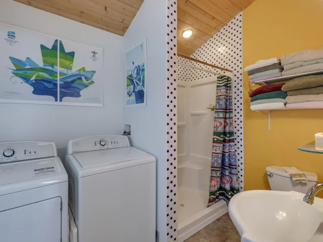 Off the sunroom is this Laundry and 2nd Bath