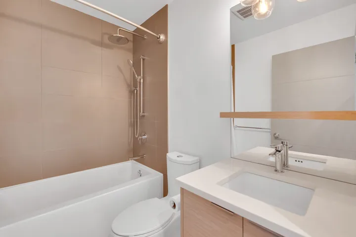 Full bathroom with vanity and  shower combination