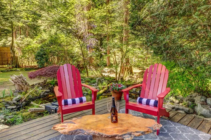 Outdoor wood-finish deck featuring a live-edge wood table