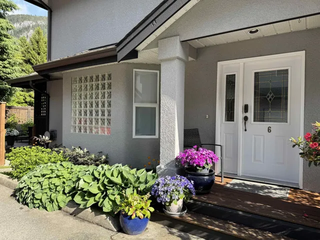 Property entrance with stucco siding
