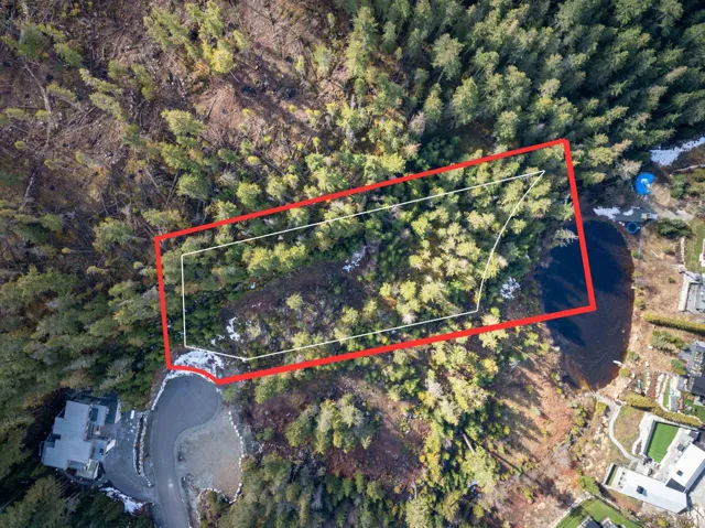 Aerial overview of property's location featuring property boundaries highlighted