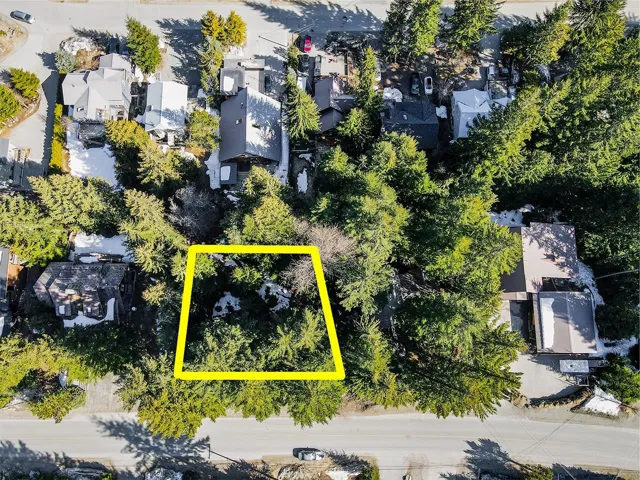 Aerial perspective of suburban area with property parcel outlined