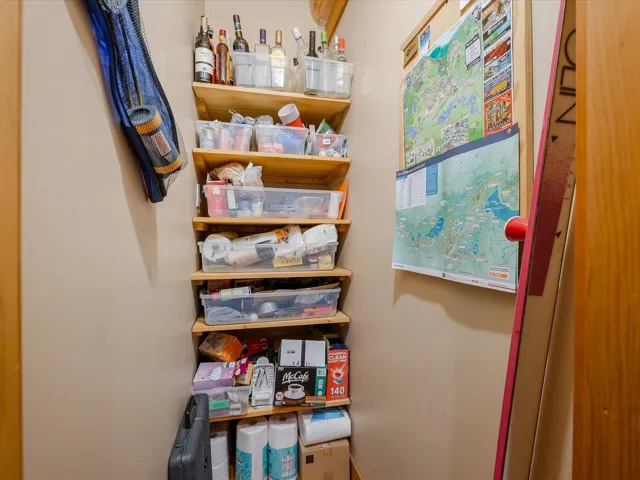 The pantry is located adjacent to the kitchen on the main level of the home.
