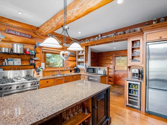 Granite countertops and stainless steel appliances throughout.