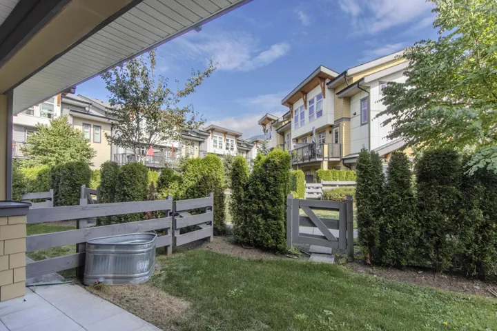 Access from the flex room area to fenced yard and landscaped courtyard access