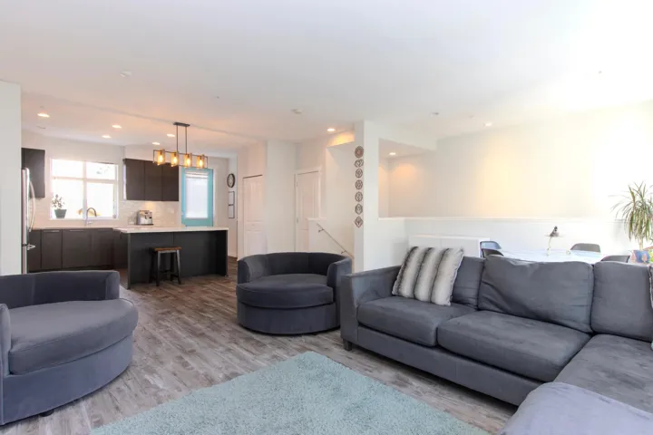 Spacious living room with plenty of room for dining area and seamlessly flow to kitchen....a great area to gather