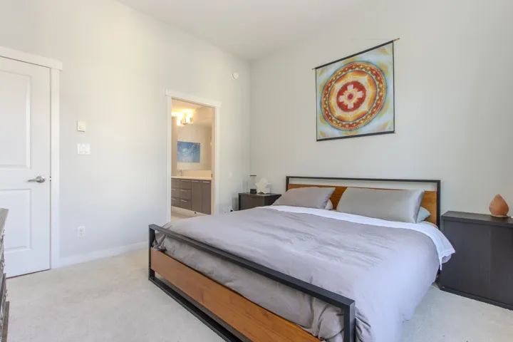 Spacious primary bedroom with large en-suite and oversized walk in closet