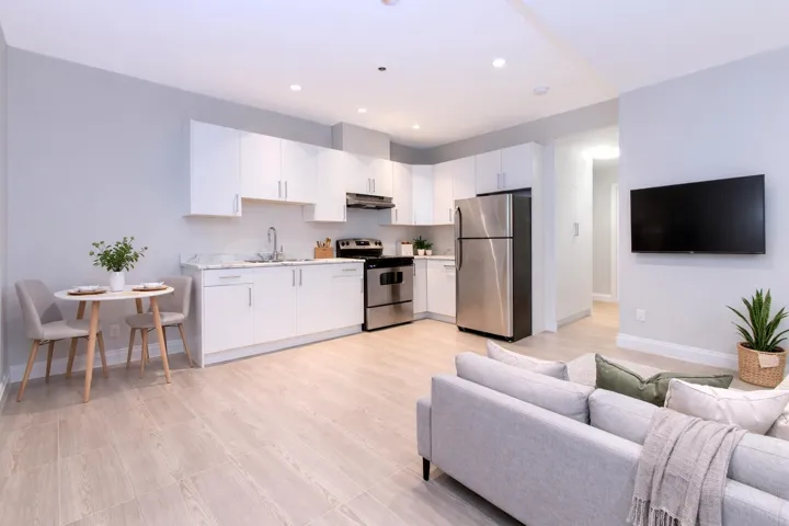 Virtually staged Nanny suite living/dining area