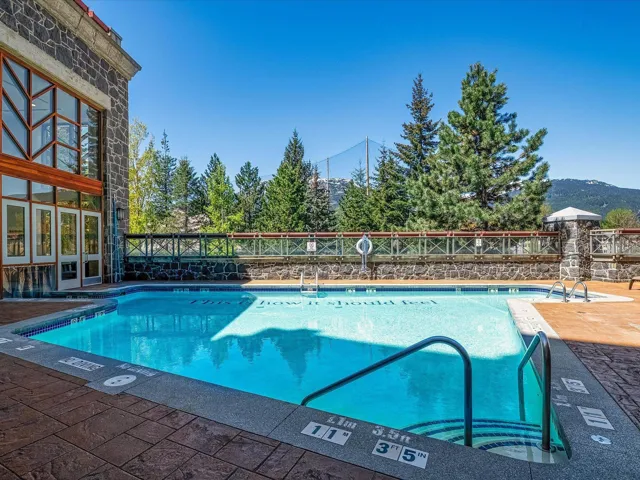 Community pool with a patio area