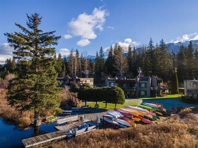 View of community featuring a boat dock