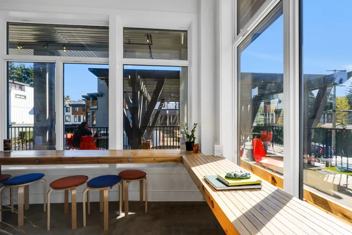 Expansive window wall with white framing