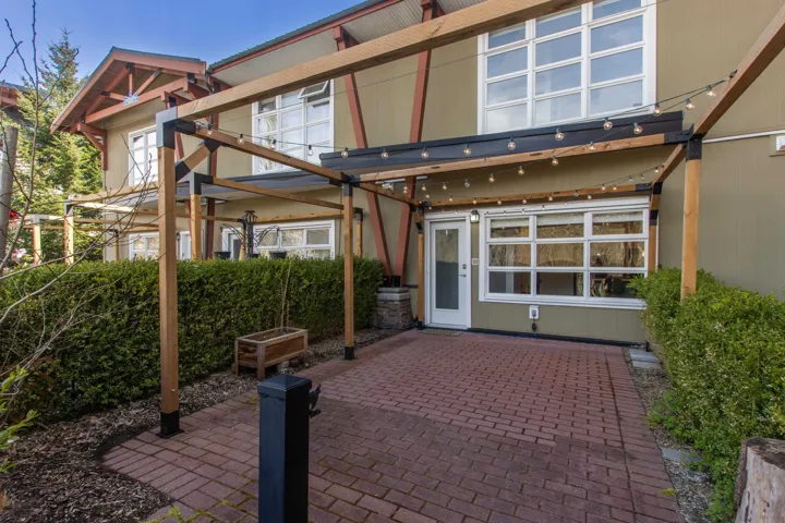 Walk up Townhome with oversized patio with pergola creates a wonderful space to enjoy the views and entertain in the summer!