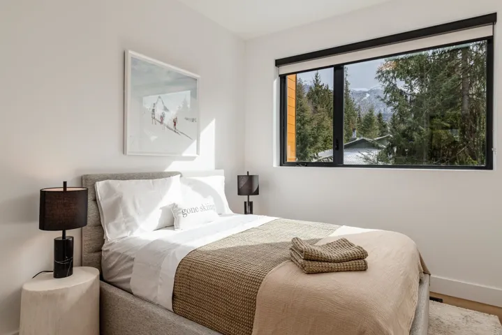Full bathroom featuring recessed lighting, toilet, heated flooring, heated towl rack, shower with black finishes