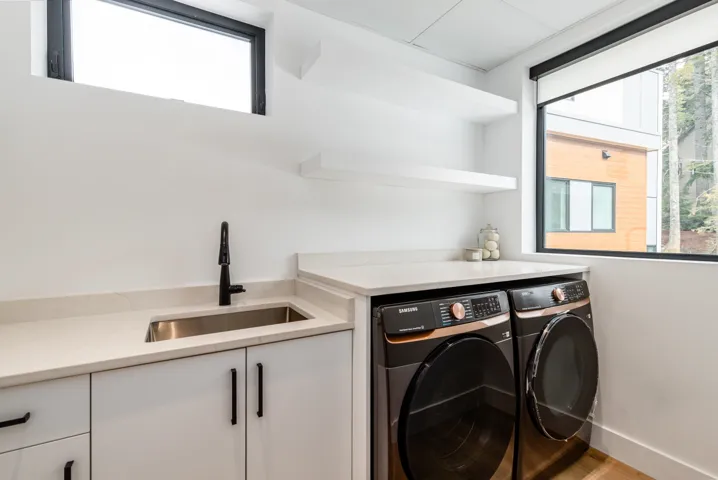 Bathroom with toilet, recessed lighting, tub / shower combination, and vanity