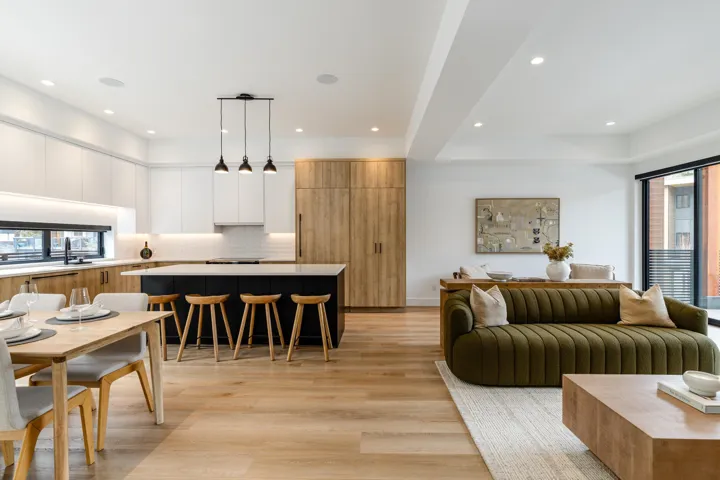 Open-concept living area featuring light wood-finish flooring throughout