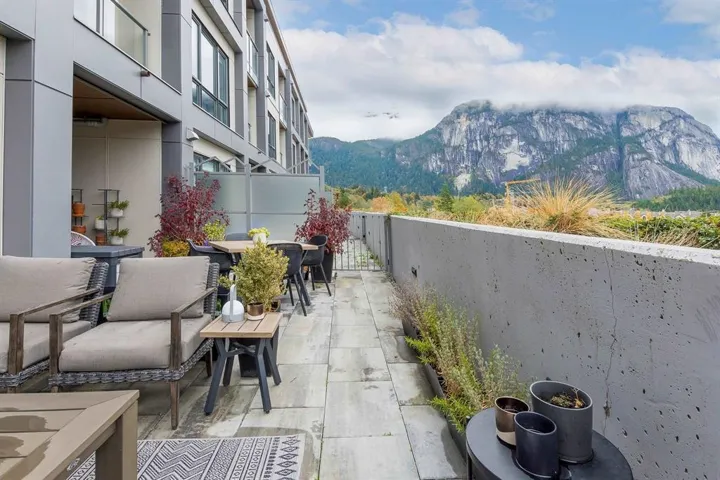View of patio / terrace with a mountain view and outdoor dining area