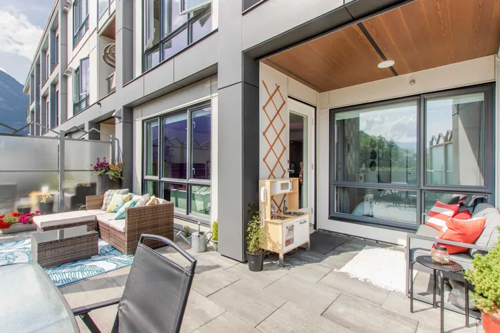 View of patio with an outdoor hangout area