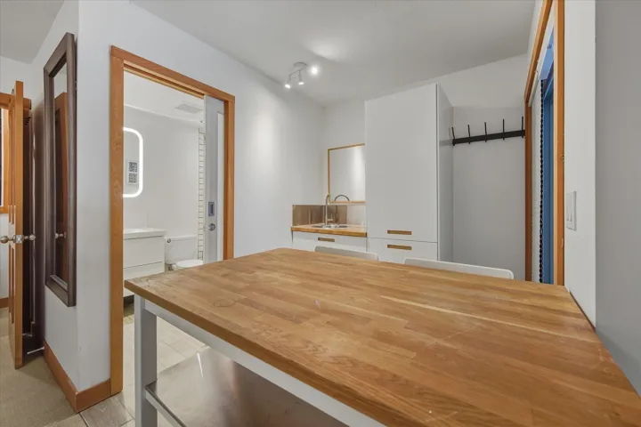 Half bathroom featuring toilet and vanity