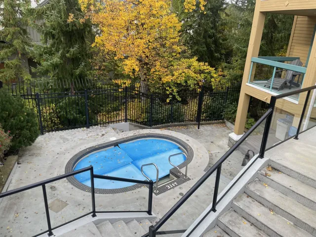 Swimming pool with a patio
