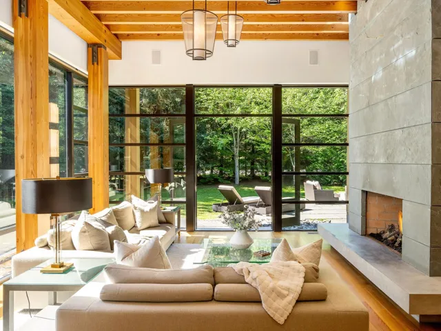 Sunroom featuring beamed ceiling