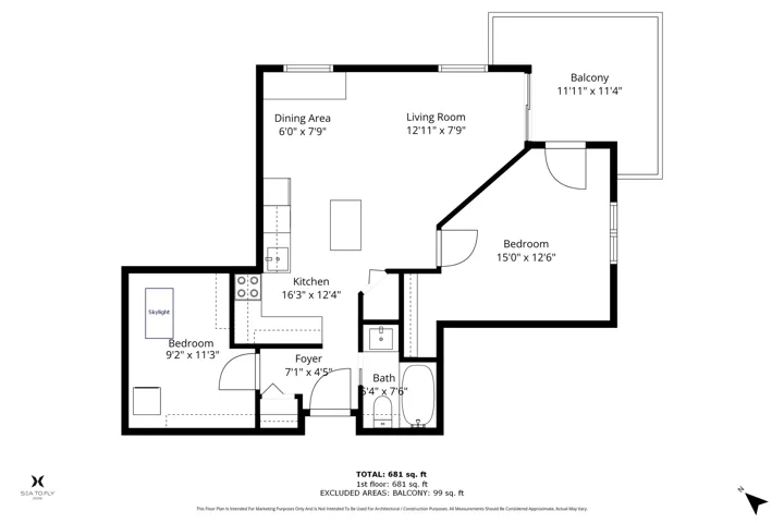 Community overview featuring residential properties, a multi-lane roadway, and extensive natural tree lines