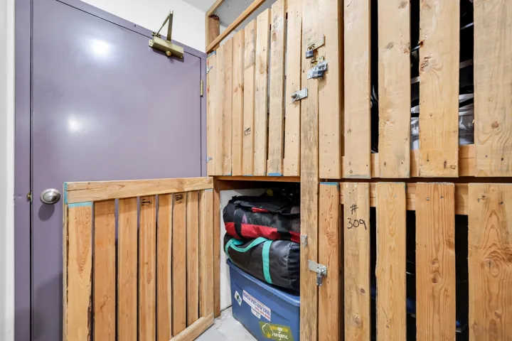 Secure storage units featuring wooden slat construction and individual locking mechanisms