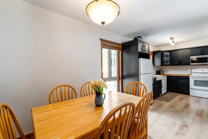 Dining space with light wood-style flooring