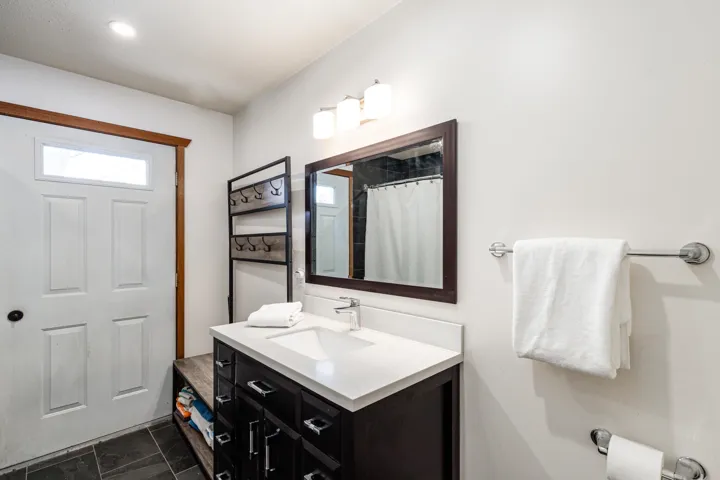 Full bathroom featuring vanity and a shower with curtain