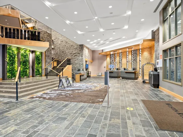 Balcony with a residential view and a mountain view