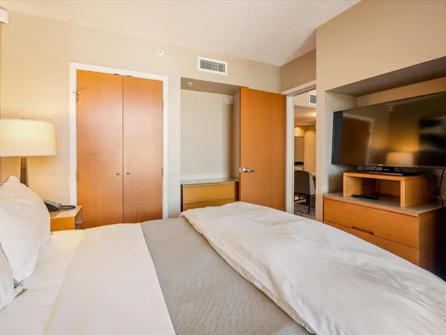 Kitchen with appliances with stainless steel finishes, a sink, and backsplash