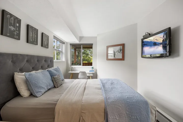 Bedroom featuring baseboard heating