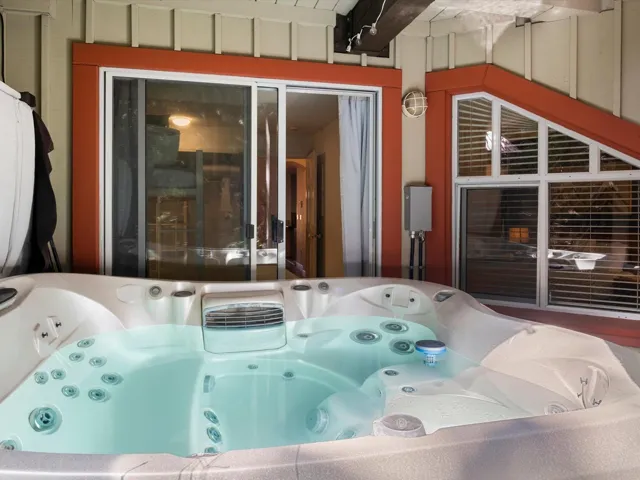 Exterior space featuring a hot tub