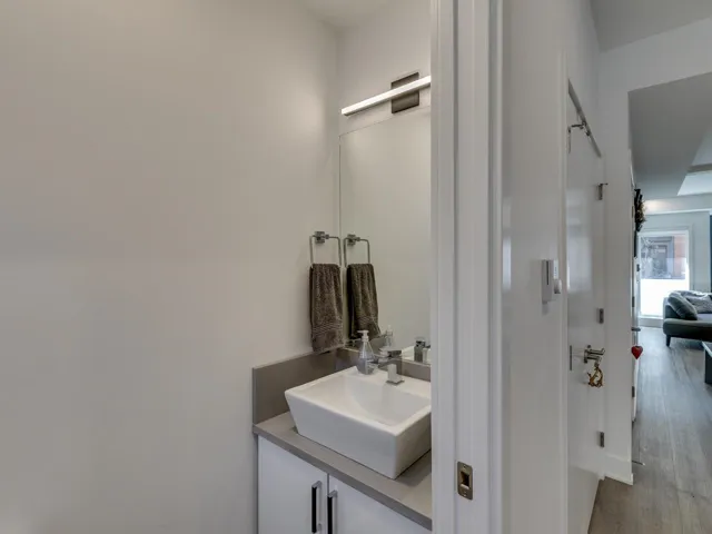 Bathroom featuring wood finished floors and vanity