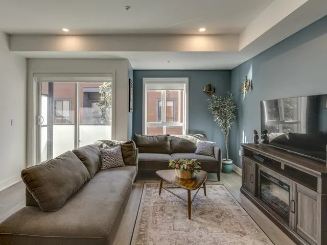 Living area featuring recessed lighting, light wood-type flooring, and baseboards