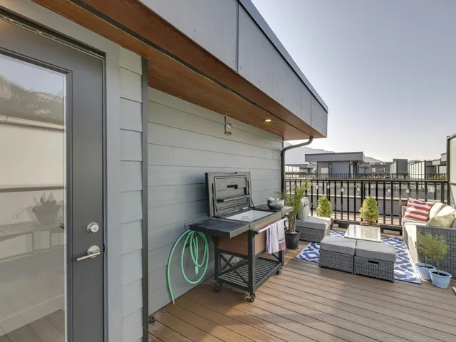 Wooden terrace featuring an outdoor living space