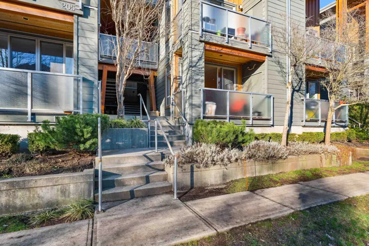 View of apartment building / complex featuring stairway