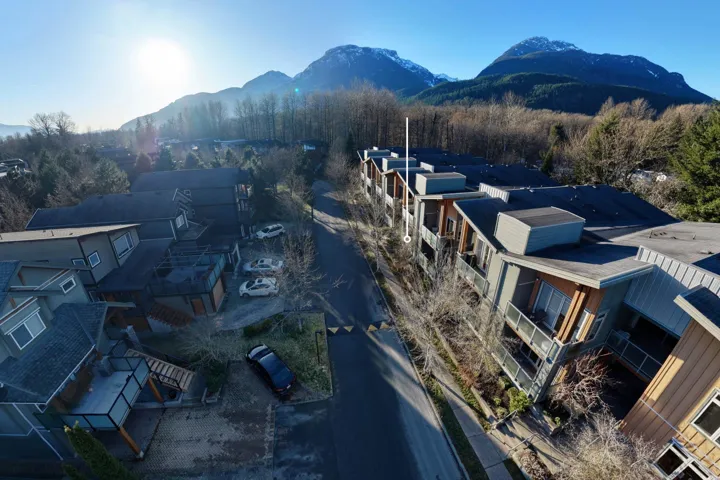 Aerial view of residential area with mountains