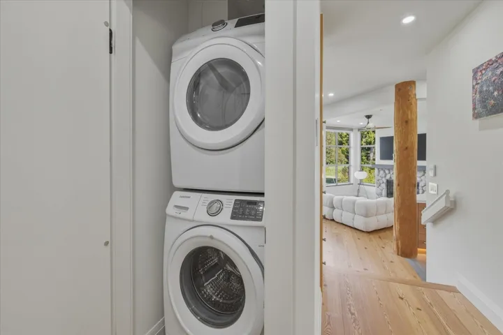 Stackable laundry appliances within a dedicated closet