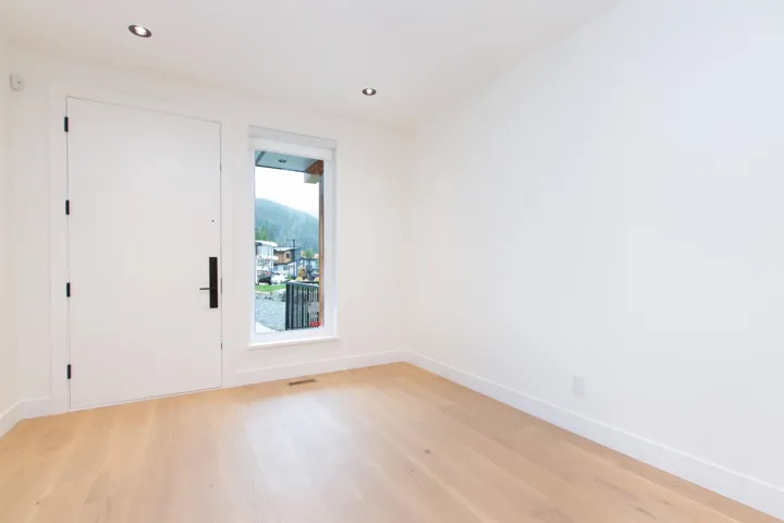 Spare room featuring light wood-style flooring and recessed lighting