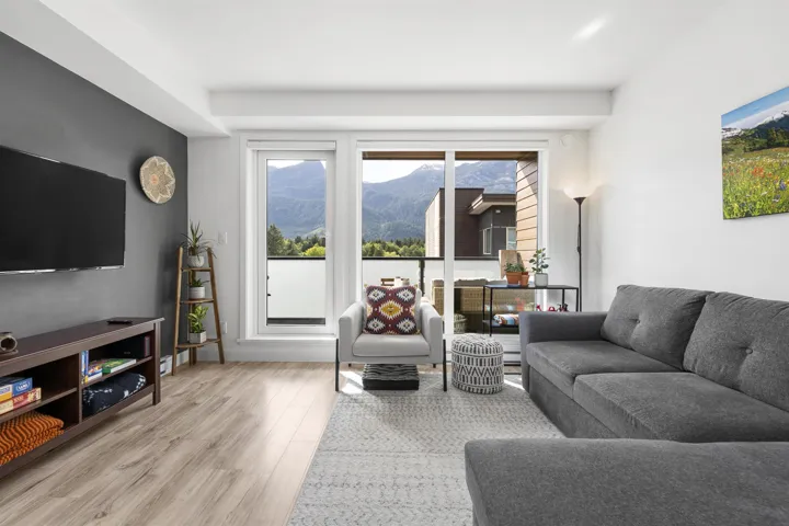 Living area with light wood-type flooring