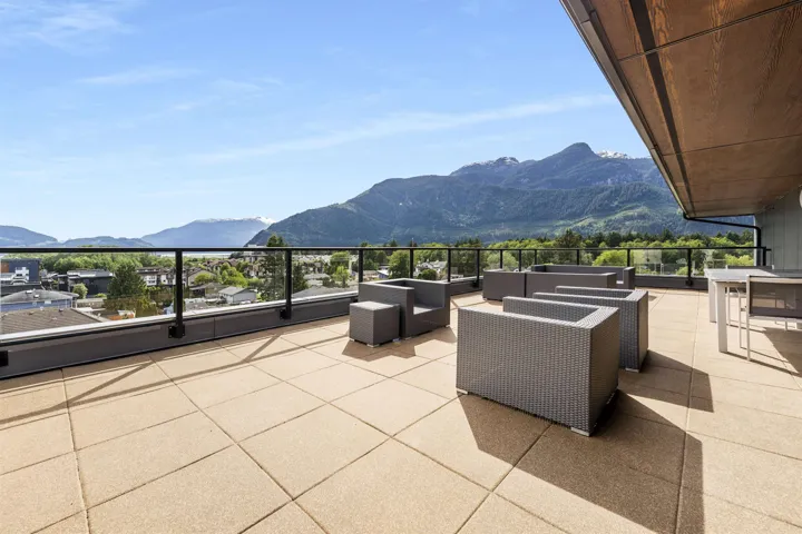View of patio / terrace featuring a mountain view and outdoor seating