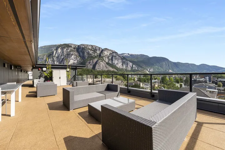 View of patio / terrace featuring a mountain view and outdoor furniture