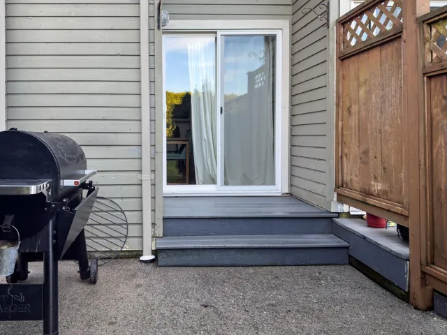 Property entrance with a deck