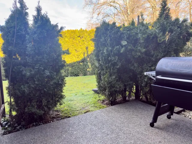 Exterior space with a grill