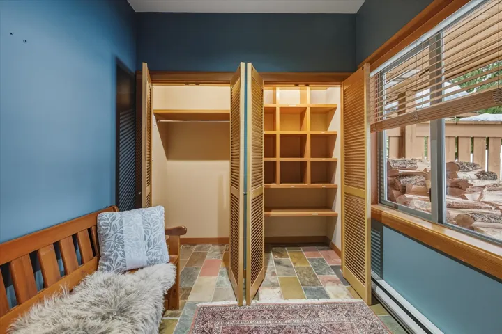 Unfurnished room featuring stone tile floors