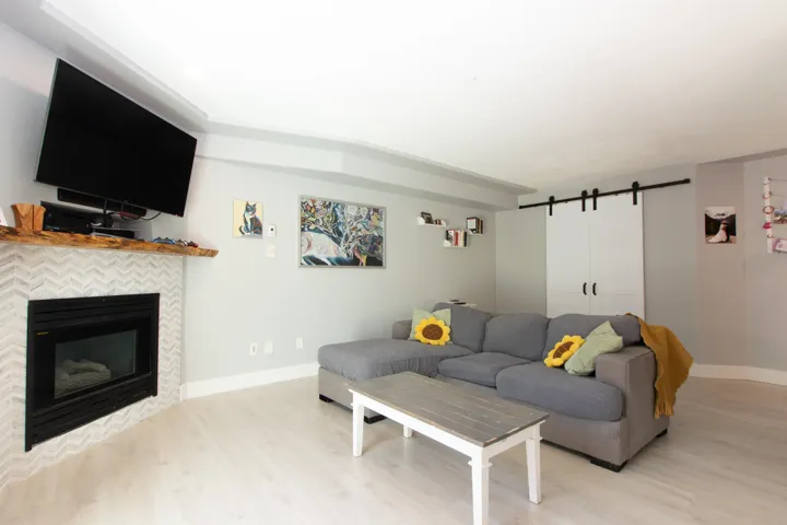 Fenced backyard featuring grilling area, a patio, and outdoor lounge area