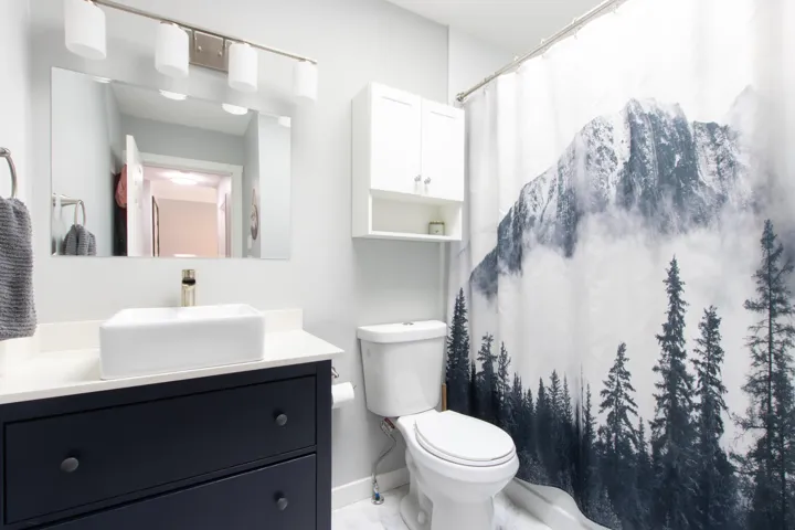 Recreation room with light wood-style flooring