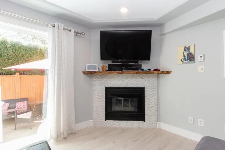 Stairs featuring wood finished floors and baseboards