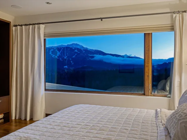 Bedroom featuring a mountain view