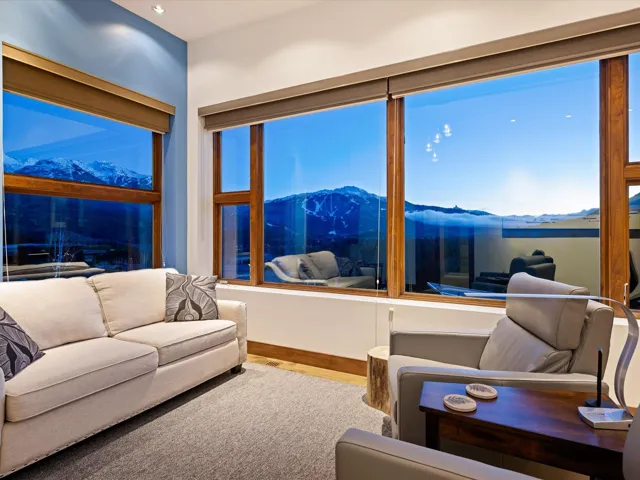 Living room featuring a mountain view and wood finished floors